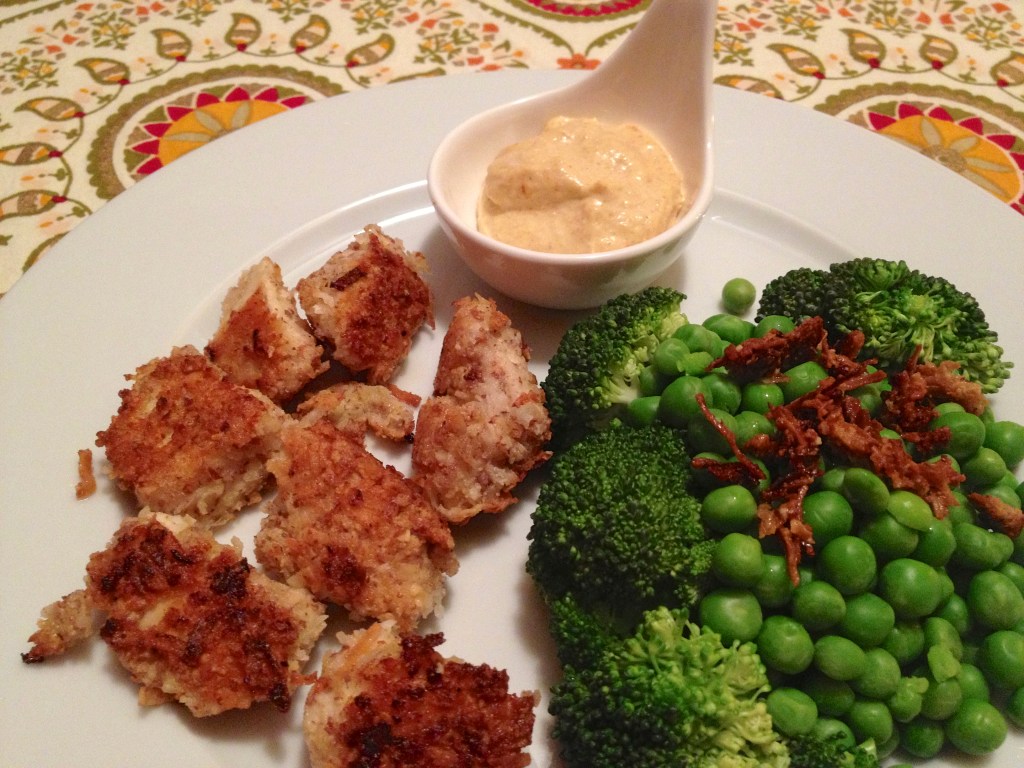 The final result: Coconut chicken nuggets, steamed broccoli & peas, and aioli